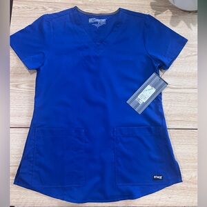 Grey’s Anatomy V-neck 2-pocket scrub top. Size small. Galaxy.